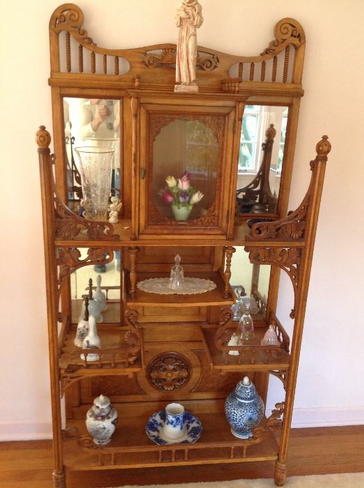 Exquisite carved antique cabinet