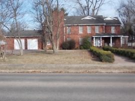 20 room Custom brick home with pool.