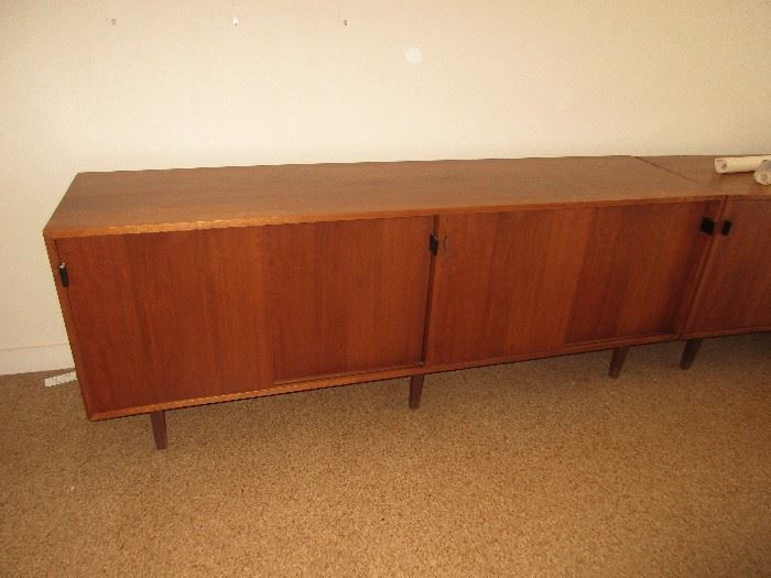 We have 2 Florence knoll international credenza  with leather pulls