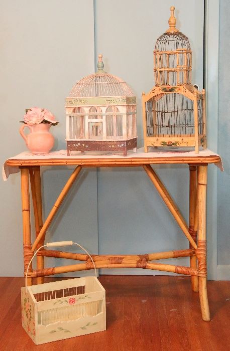 The smaller birdcage and basket on floor sold.