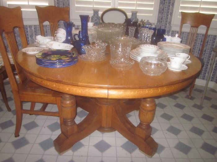 ROUND OAK DINING TABLE & CHAIRS.  HAVILAND CHINA, COBALT GLASS & FOSTORIA'S "AMERICAN"