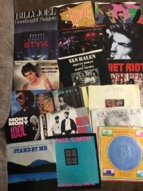 Nice vintage (1980s) collection of 45 rpm records--some picture sleeves as shown and others without sleeves.