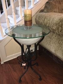 Lighted glass and metal table.