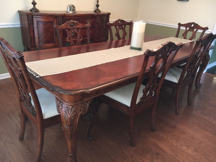 Beautiful Broyhill cherry dining room furniture from Haverty's--table, 6 chairs and buffet, all in excellent condition. With leaves, table extends to 9'.