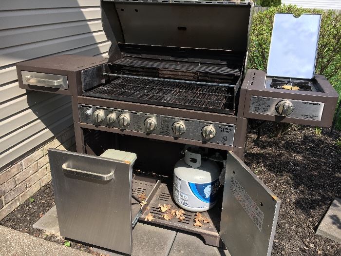 Charmglow heavy duty gas grill with rotisserie.