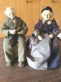 Audrey Waite paper mache doll couple. He is reading a passage from the Bible....Proverbs 10: 4, 6