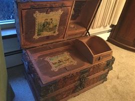 Trunk with hat, shoe, and glove compartment.