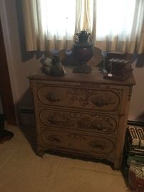 Antique dresser with wood carved drawer pulls