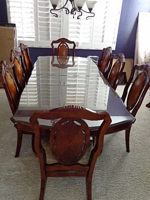 AICO Dining table and 8 chairs