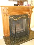 HAND CARVED WOODEN MANTEL