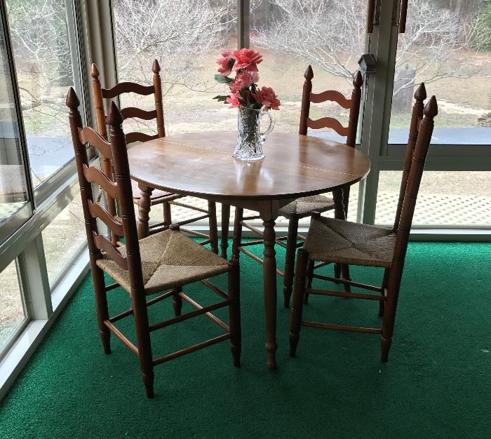 Kitchen Table with 4 cane bottom chairs