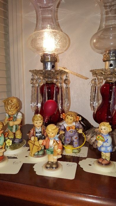 Selection of Hummel figurines along with a very nice matched pair of prism lamps