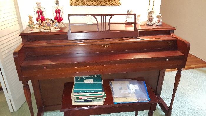 Lester brand piano and bench - serial number dates to 1958.  Very beautiful mahogany.
