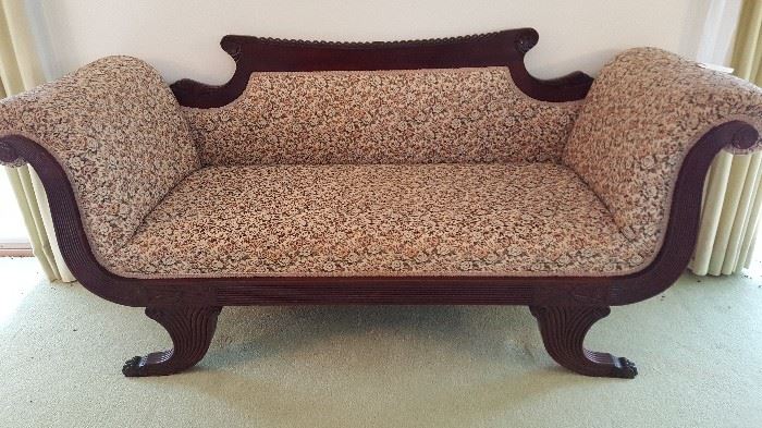 Fabulous circa late 1800's upholstered mahogany sofa.  Federal style with beautifully detailed wood.
