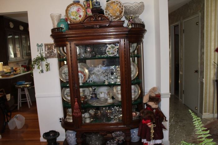 Antiques hutch loaded with glassware