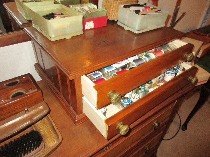 Antique thread spool cabinet