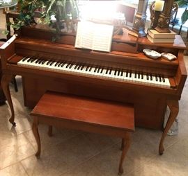 Betsy Lynn spinet piano with matching bench. Wood cabinet with Queen Anne legs. Great condition and plays beautifully. Gilt candlestick trio, Chinese export porcelain vase on carved stand and Limoges porcelain dish.