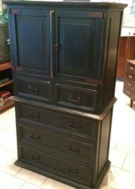 Gorgeous all wood storage piece topped with double doors and 5 drawers. Black waxed wood finish with vintage detailing.