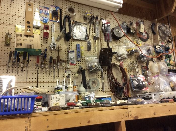 Hand tools such as screwdrivers, hammers and wrenches, saw blades and assorted hardware