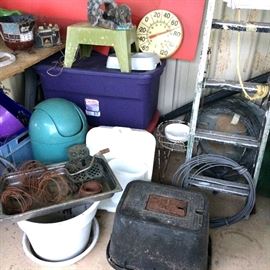 Funky, junky and fun items for display and collecting. Plastic storage bins, ladder, old water meter, rusty wire, plant pots