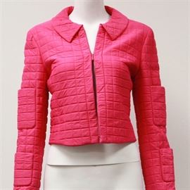 Chanel Contemporary Pink Quilted Jacket: A Chanel contemporary pink quilted jacket. Featuring a contemporary design, this Chanel jacket includes a quilted construction, cropped waist, zipper front and two open pockets on each sleeve. It is tagged to the interior “Chanel Identification, P15552V08698, AF751, 36.”