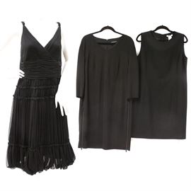 Luisa Cerano, Lafayette 148, and Luca Luca Black Cocktail Dresses: A collection of black cocktail dresses. This lot contains three pieces. Included are a sleeveless, cross-over V-neck dress by Lafayette 148; a scoop-necked dress with three-quarter length sleeves; and a jewel neck, sleeveless dress by Luca Luca.