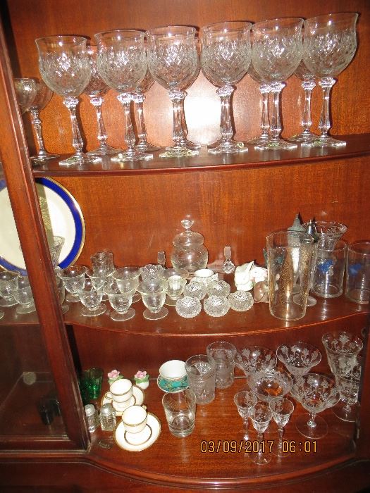 Assorted crystal stemware, salts, etched footed glasses and lots more