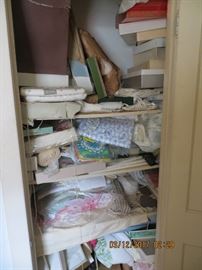 Lots of unopened sheets, pillow cases, towels, table linen and more