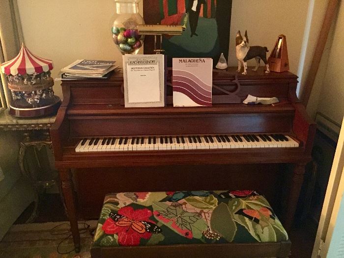 Fisher upright Piano, made by Aeolian with bench not pictured.