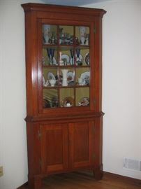 1830 Pennsylvania origin cherry (2 piece) corner cupboard 12 pane.