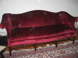 Red velvet covered sofa