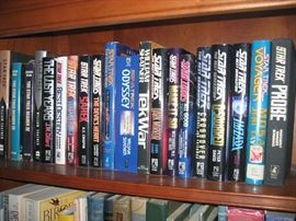 Star Trek Books, collector cards and plates .  Two bookcases Stickley