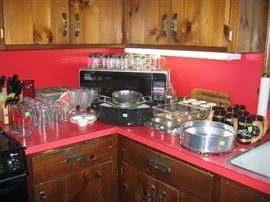 Microwave, glassware, roasting pans, Kitchen Aid cutlery set, baking pans, mugs, etc.