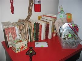 Cook books, trivets, shelf paper, recipe card holder