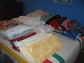 Blankets, quilts, pillow, bath rugs, bed