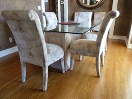 Glass top dining room table and 8 chairs