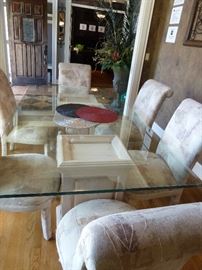 Glass top dining room table and 8 chairs