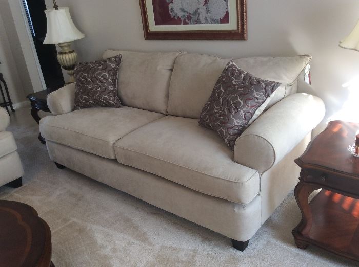 This GORGEOUS new set includes sofa, loveseat and chair! It literally has the tags on it! It was purchased to stage this home!