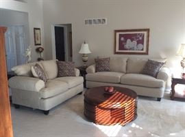 You could change the throw pillows and this set could work with almost any colors scheme! Coffee table not available for sale.