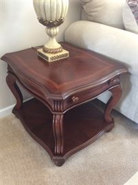 We have a coffee table, sofa table, and coordinating end tables by American Signature!