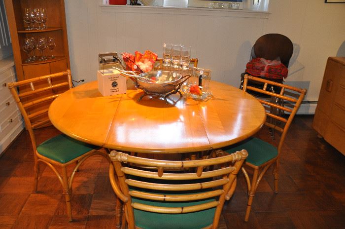 Mid Century rattan style round drop leaf table and 4 chairs by Haywood Wakefield (table is 53" round open and 19.5" with both side down)