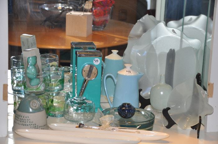Many great mid century pieces including the teal ice maker and Bennington ceramic owl bank