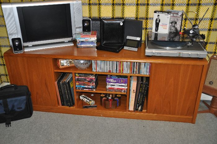 Great up close view of the made in Denmark side board! Also shown is a vintage Setton turntable and small flat screen TV