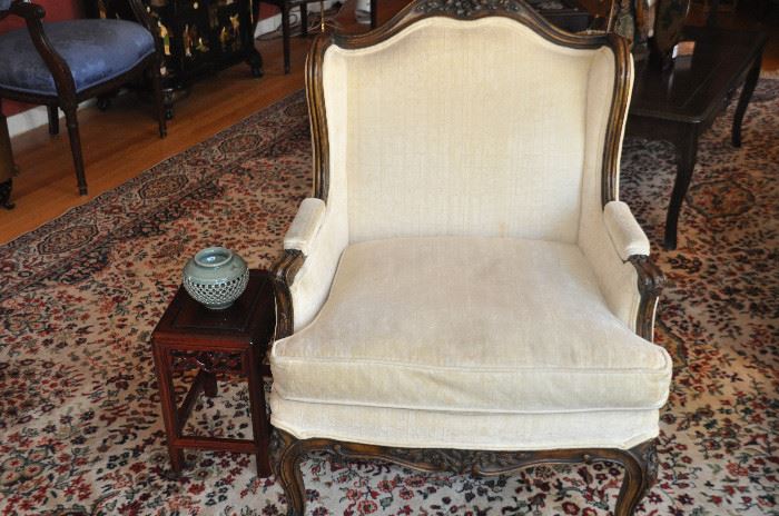 Lovely vintage petite ivory velvet Wing Back Armchair from the Curiosity Shoppe in Franklin (36"h x 28"w x 22"d) Shown with a mahogany Asian plant stand