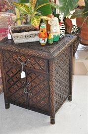 Wonderful vintage petite bamboo side table/chest shown with adorable animal Russian nesting dolls. 