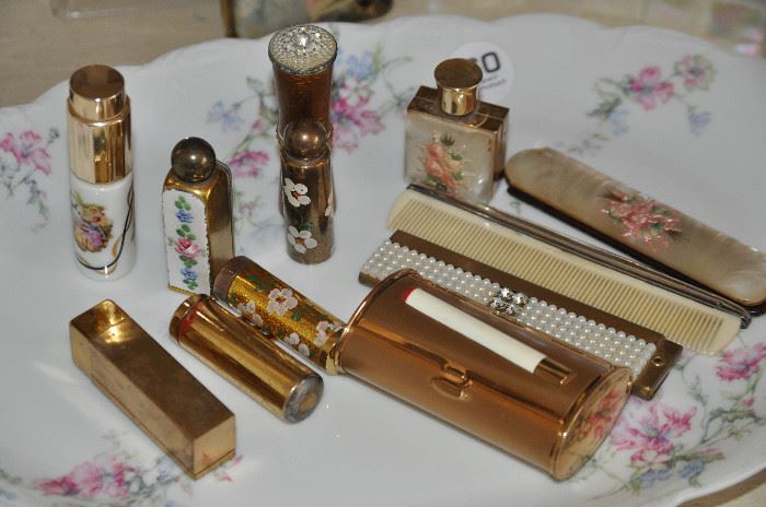 Great vintage combs and lipstick holders!