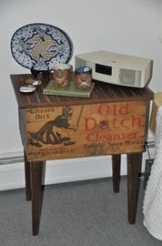 Antique Advertising chest converted to a side table! Also shown with a Bose Wave Radio