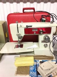Mademoiselle sewing machine with original red carrying case.