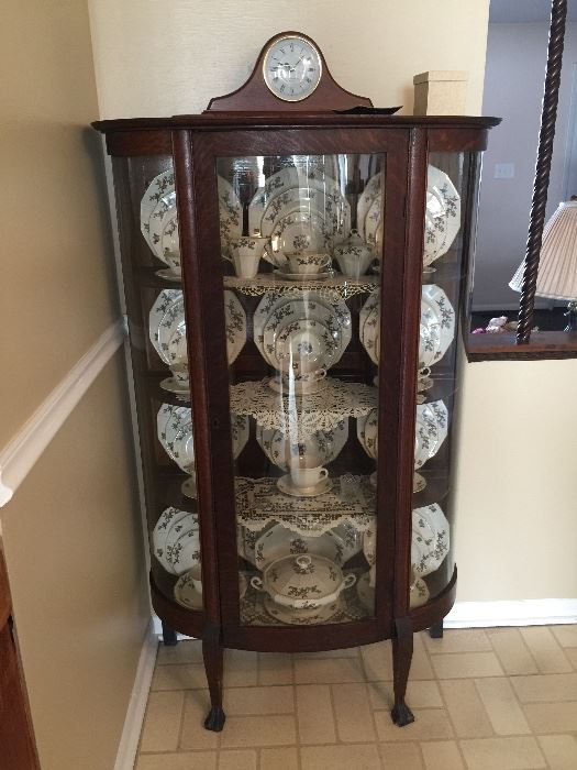 Antique curio cabinet and china