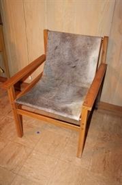 Funky mid century modern arm chair w/ leather details and cowhide seat